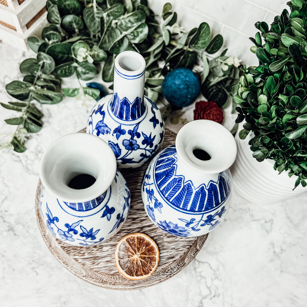 Elegant Chinoiserie Mediterranean Canton Vases in blue and white, showcasing intricate hand-painted designs, perfect for home decor.