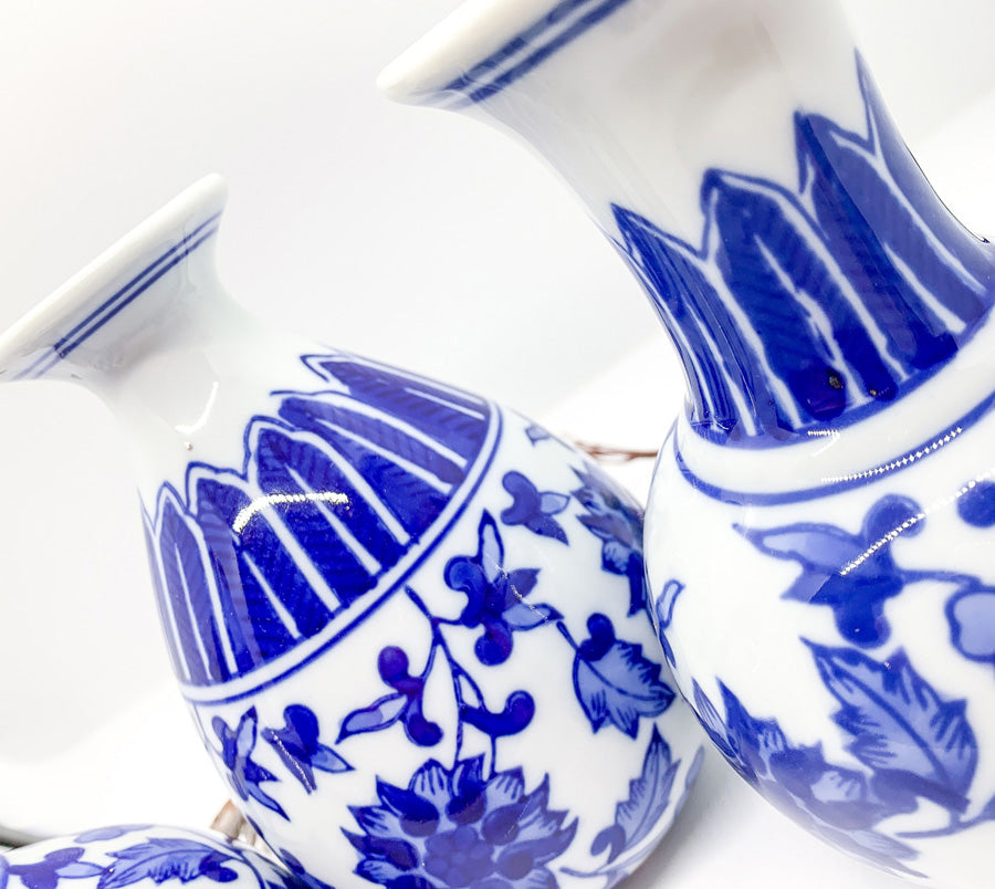 Elegant Chinoiserie Mediterranean Canton Vases in blue and white, showcasing intricate hand-painted designs, perfect for home decor.