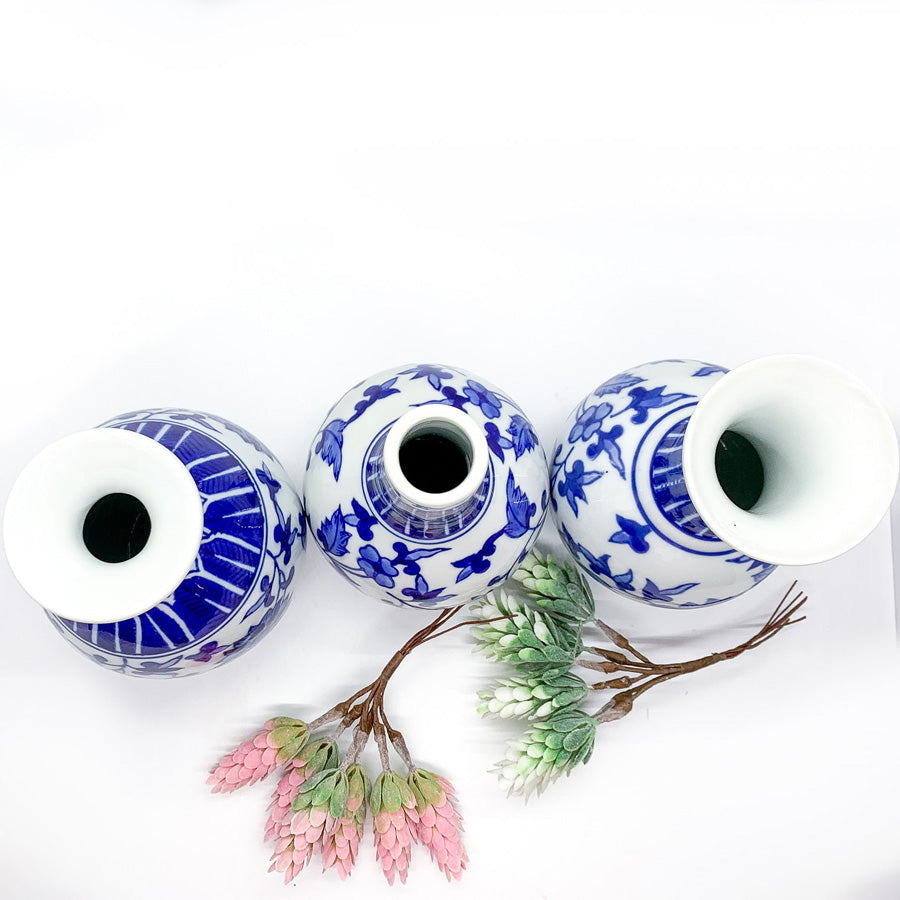 Elegant Chinoiserie Mediterranean Canton Vases in blue and white, showcasing intricate hand-painted designs, perfect for home decor.