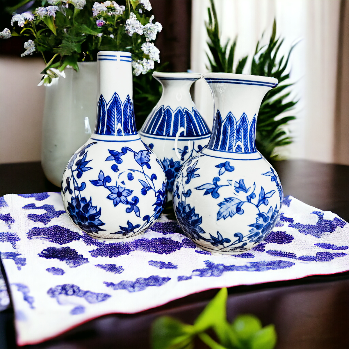 Elegant Chinoiserie Mediterranean Canton Vases in blue and white, showcasing intricate hand-painted designs, perfect for home decor.