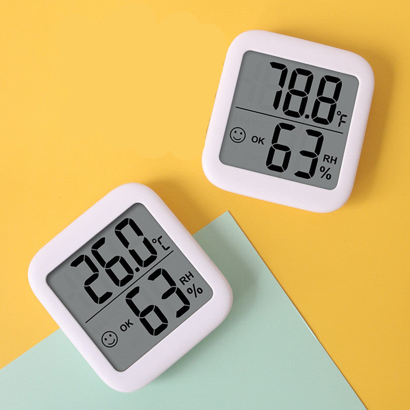 Digital Thermometer Hygrometer with LCD display, measuring temperature and humidity, designed for indoor use.