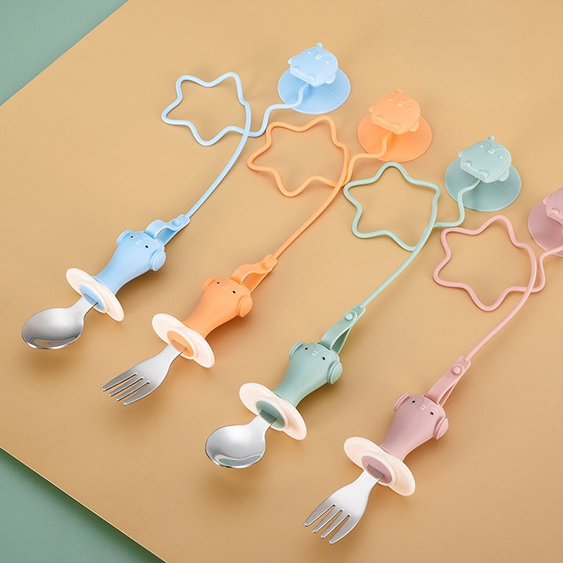 Infant Stainless Steel Training Spoon Fork with anti-drop chain and suction cup, designed for easy grip and self-feeding.