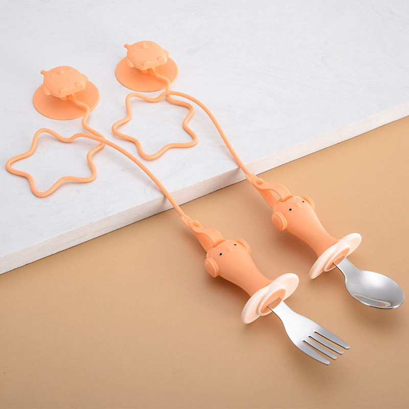 Infant Stainless Steel Training Spoon Fork with anti-drop chain and suction cup, designed for easy grip and self-feeding.