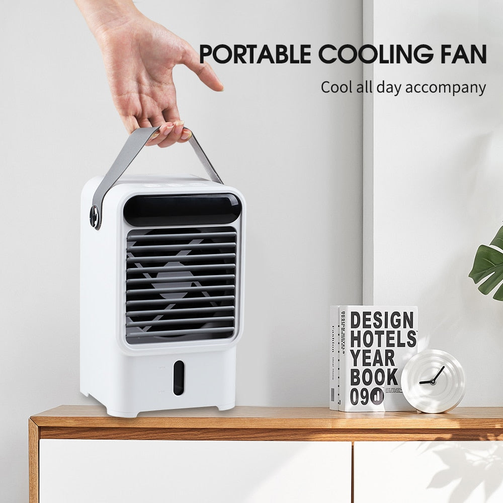 Mini Portable Air Conditioner Fan with water tank and soft mood lighting, designed for rapid cooling in any room.