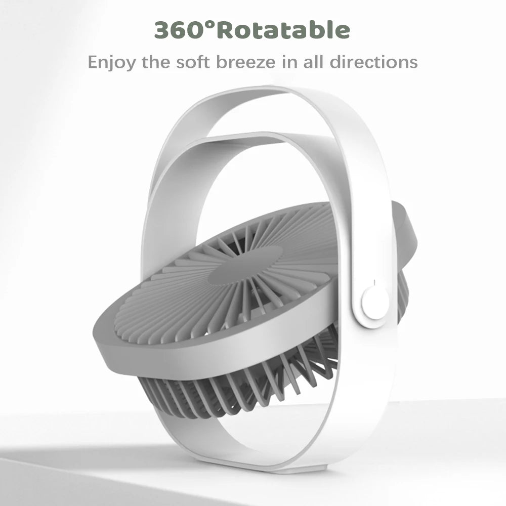 Rechargeable Desktop Fan in blue color, featuring a compact design and 360° rotatable head, perfect for desk use.