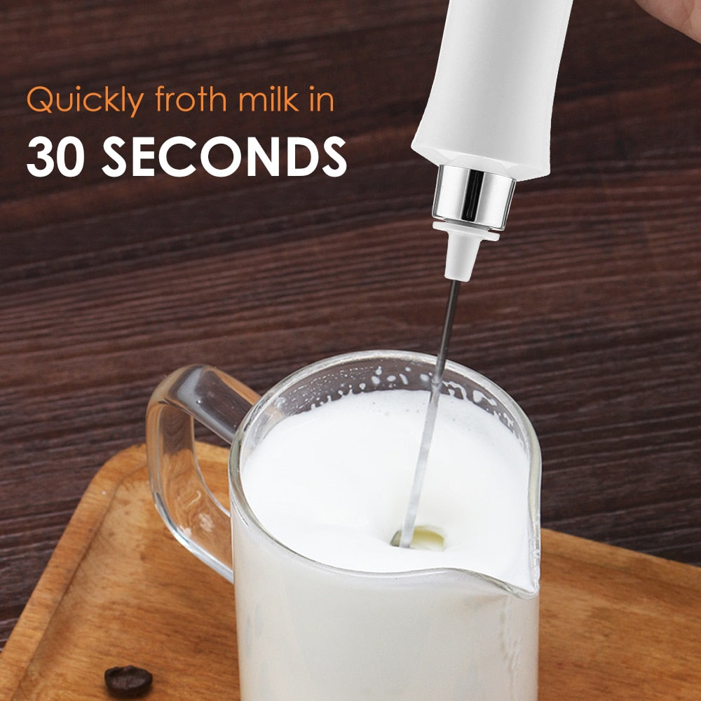 3 in 1 Milk Frother Electric Milk Foamer in white and black, showcasing its sleek design and interchangeable mixing heads.