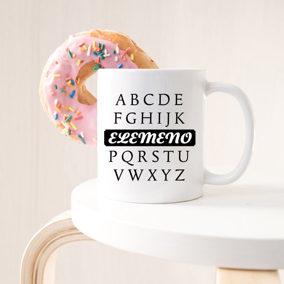 A humorous coffee mug featuring the phrase A, B, C, D, E, F, G, H, I, J, K, ELEMENO, P, Q, R, S, T, U, V, W, X, Y, Z, crafted from high-quality ceramic.