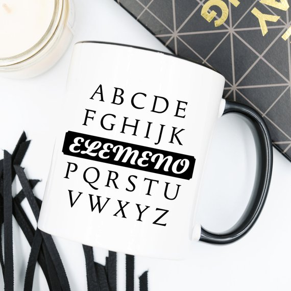 A humorous coffee mug featuring the phrase A, B, C, D, E, F, G, H, I, J, K, ELEMENO, P, Q, R, S, T, U, V, W, X, Y, Z, crafted from high-quality ceramic.