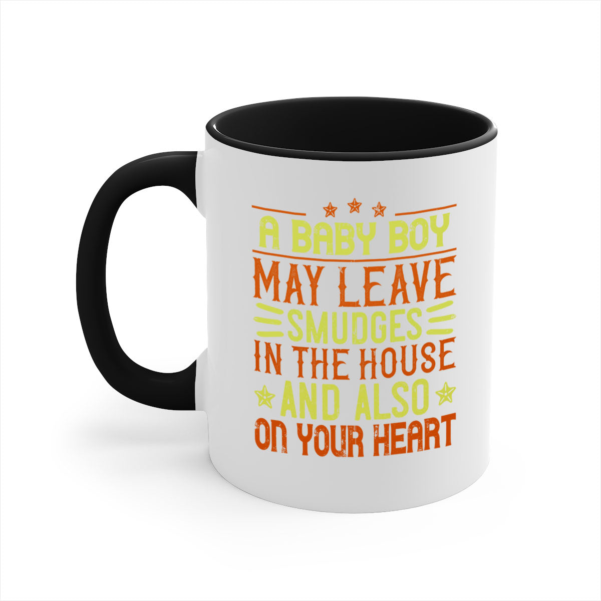 A stylish two-tone ceramic mug with a colored handle and glossy finish, perfect for coffee or tea, featuring the phrase 'A baby boy may leave smudges in the house and also on your heart.'