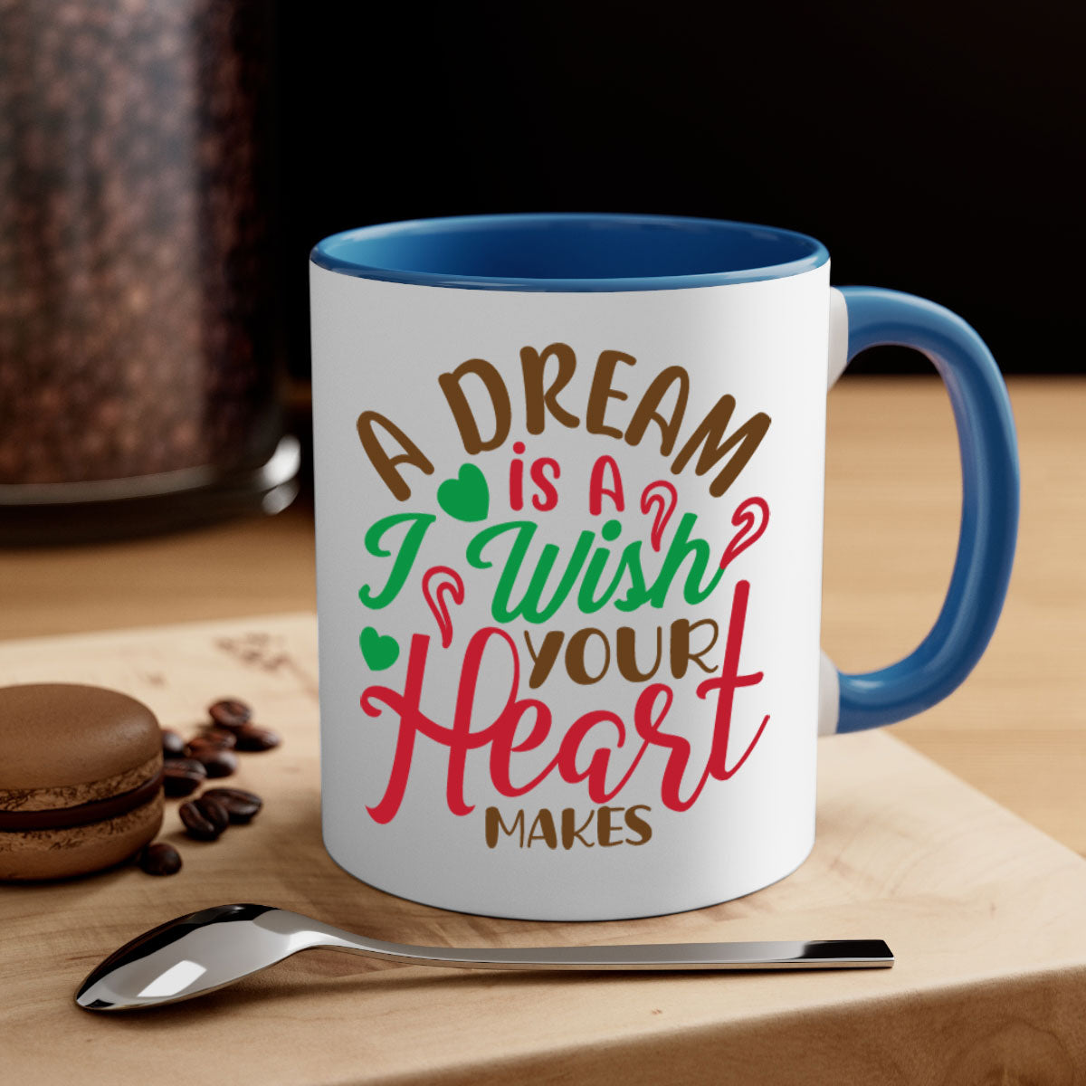 A two-tone ceramic coffee mug featuring the phrase 'A Dream Is A Wish Your Heart Makes', available in multiple colors with a glossy finish.