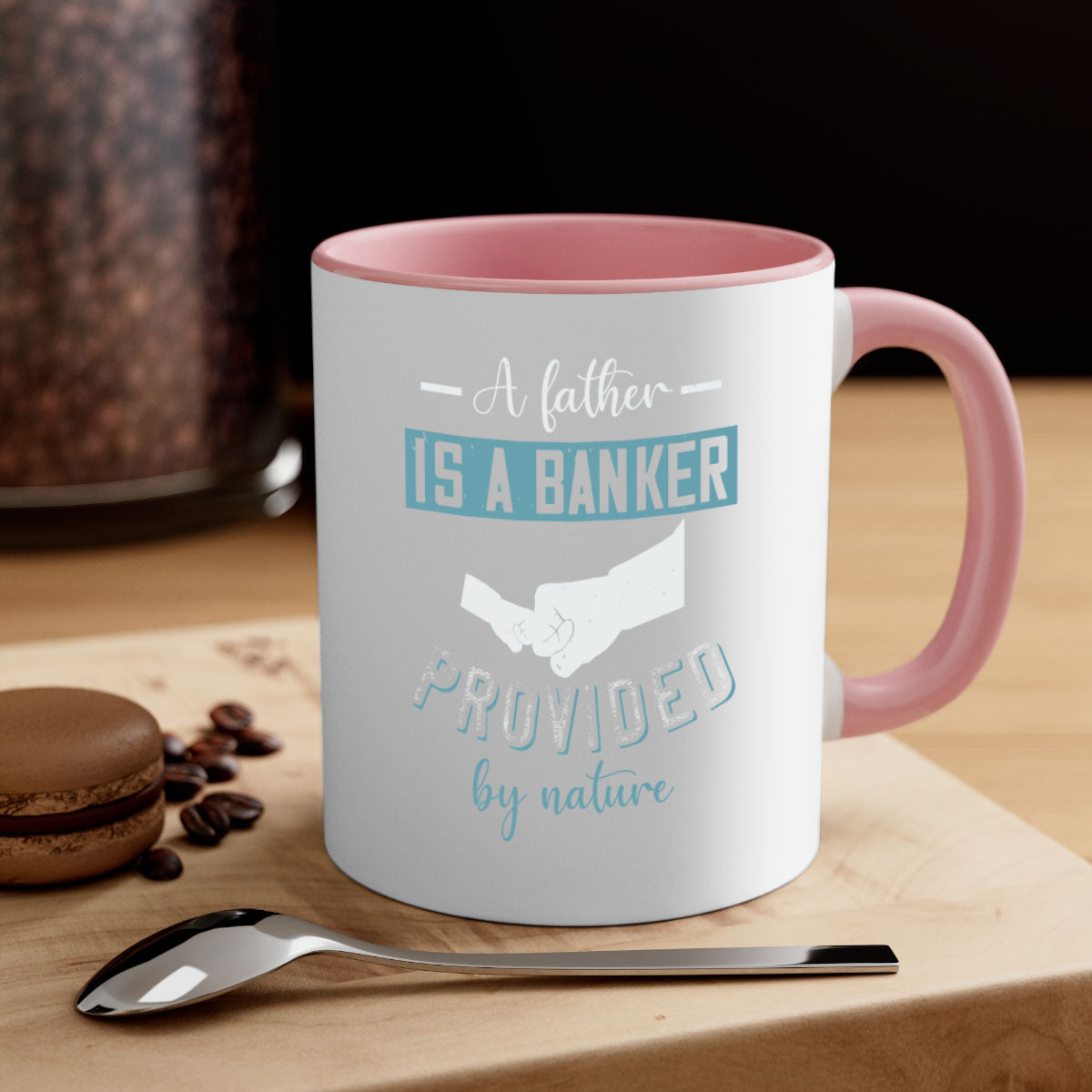 A stylish two-tone coffee mug with 'A Father is a Banker' design, featuring a colored handle and glossy finish, available in multiple colors.