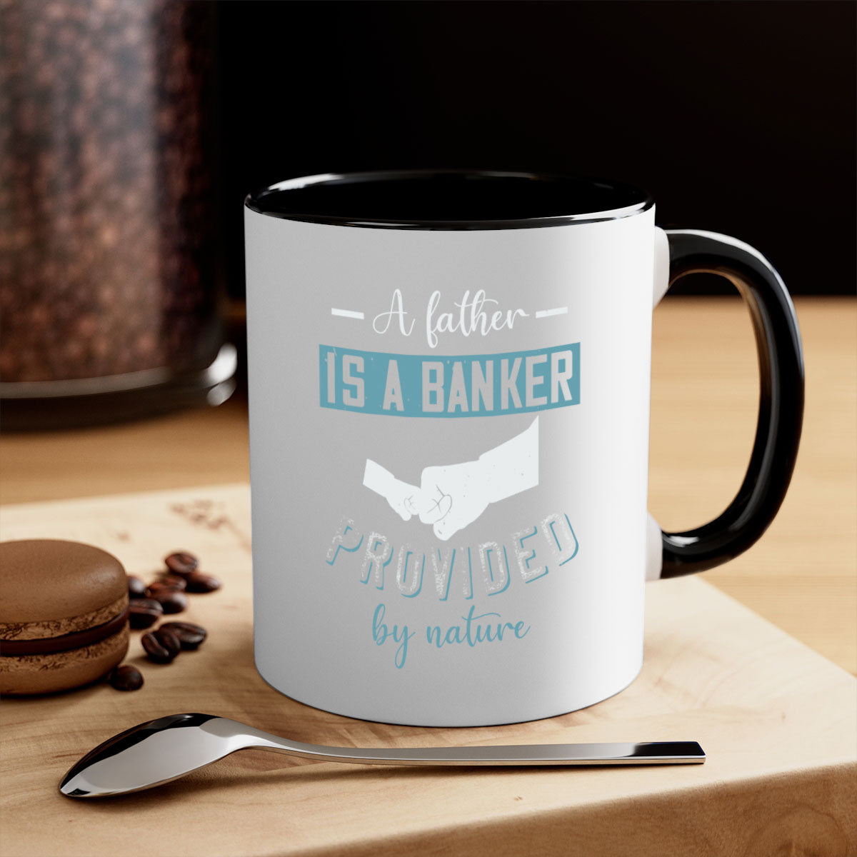 A stylish two-tone coffee mug with 'A Father is a Banker' design, featuring a colored handle and glossy finish, available in multiple colors.