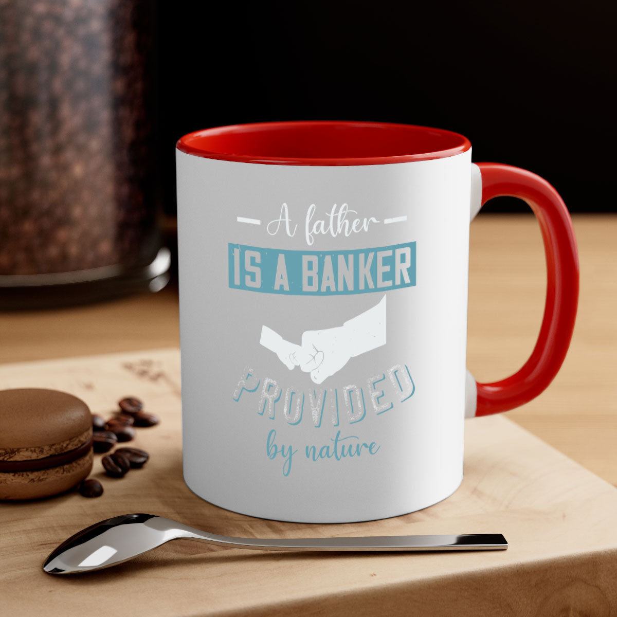 A stylish two-tone coffee mug with 'A Father is a Banker' design, featuring a colored handle and glossy finish, available in multiple colors.