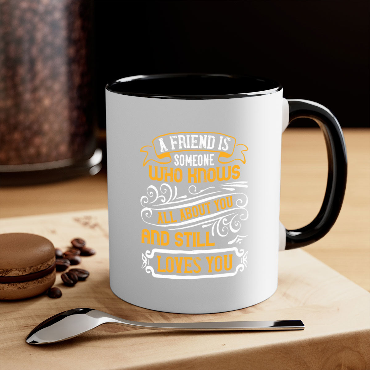 A stylish two-tone ceramic mug with a colored handle and glossy finish, featuring the phrase 'A friend is someone who knows all about you and still loves you'.