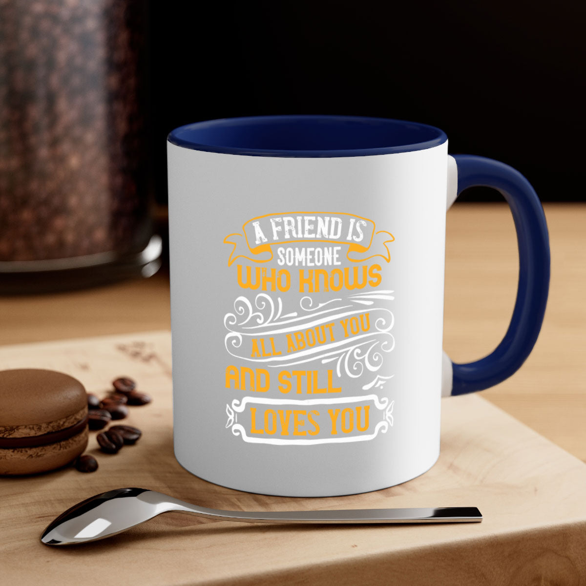 A stylish two-tone ceramic mug with a colored handle and glossy finish, featuring the phrase 'A friend is someone who knows all about you and still loves you'.