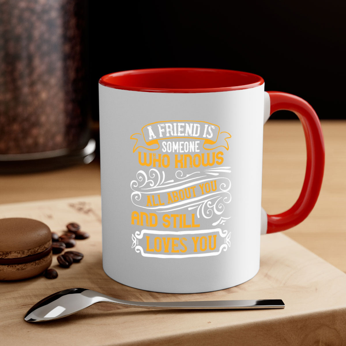 A stylish two-tone ceramic mug with a colored handle and glossy finish, featuring the phrase 'A friend is someone who knows all about you and still loves you'.