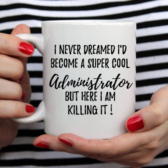 A stylish white ceramic mug featuring a vibrant design on both sides, perfect for administrators.