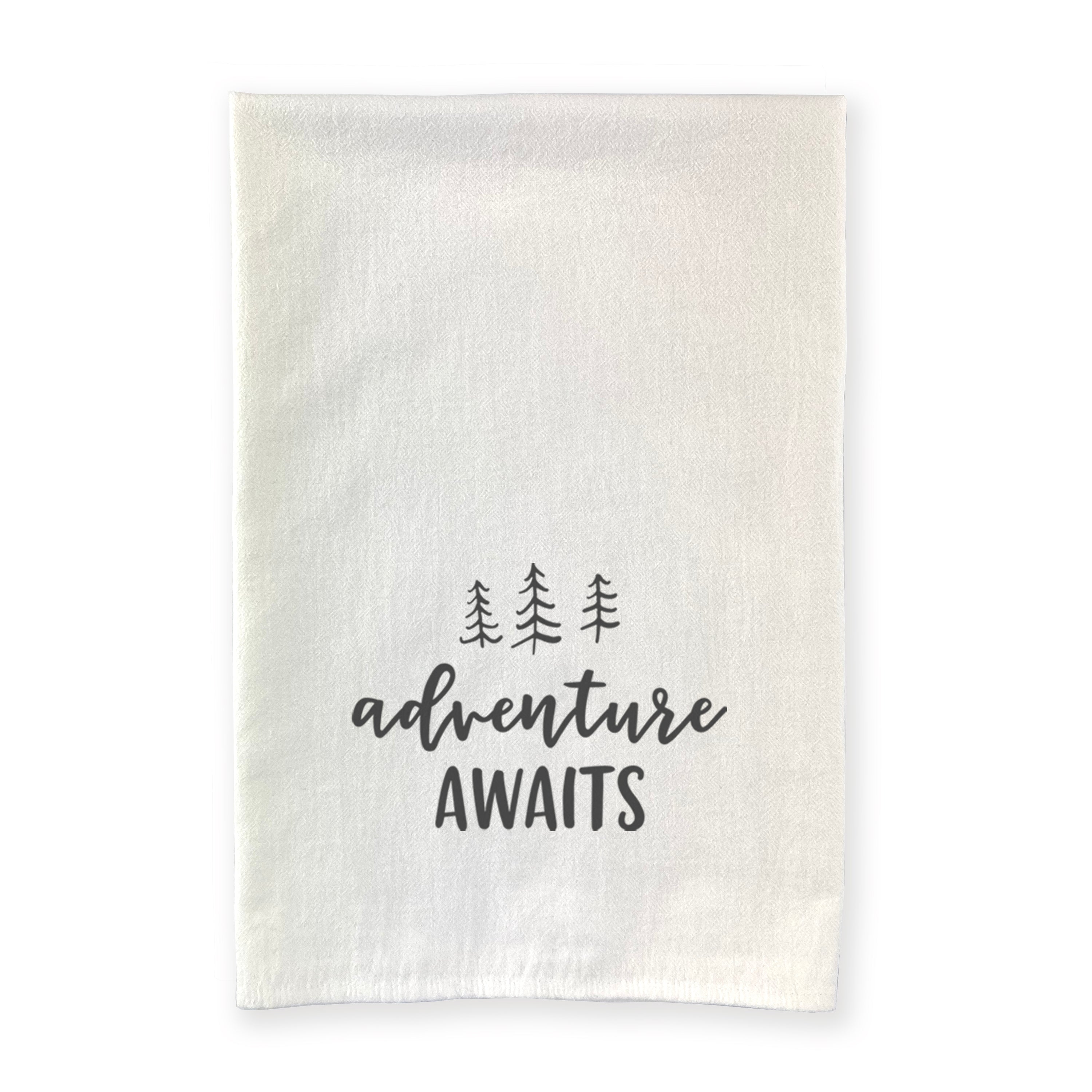 Adventure Awaits cotton tea towel featuring a vibrant tree design, made from 100% absorbent cotton, perfect for kitchen use.