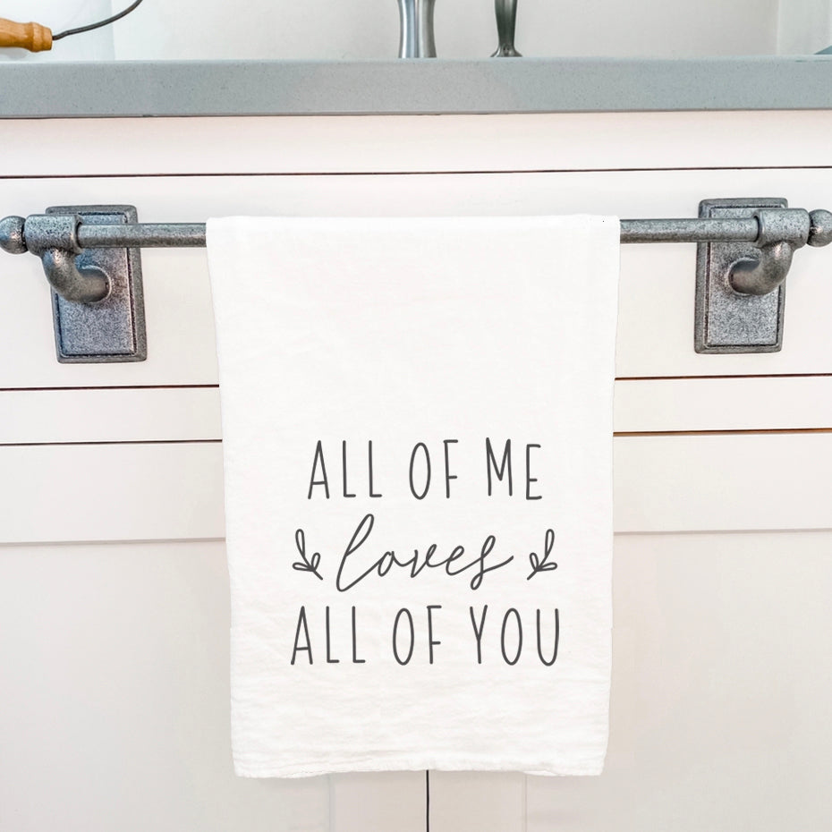 All of Me Loves All of You cotton tea towel featuring a vibrant design, made from 100% absorbent cotton, perfect for kitchen use.