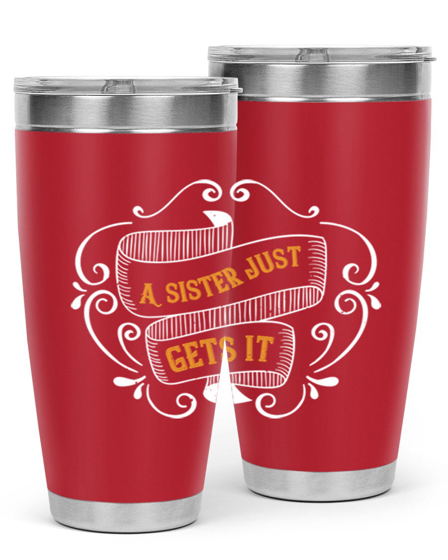 A stylish 20oz stainless steel tumbler with the phrase 'All You Need Is Love… and a Sister' printed on it, showcasing its double wall vacuum design.