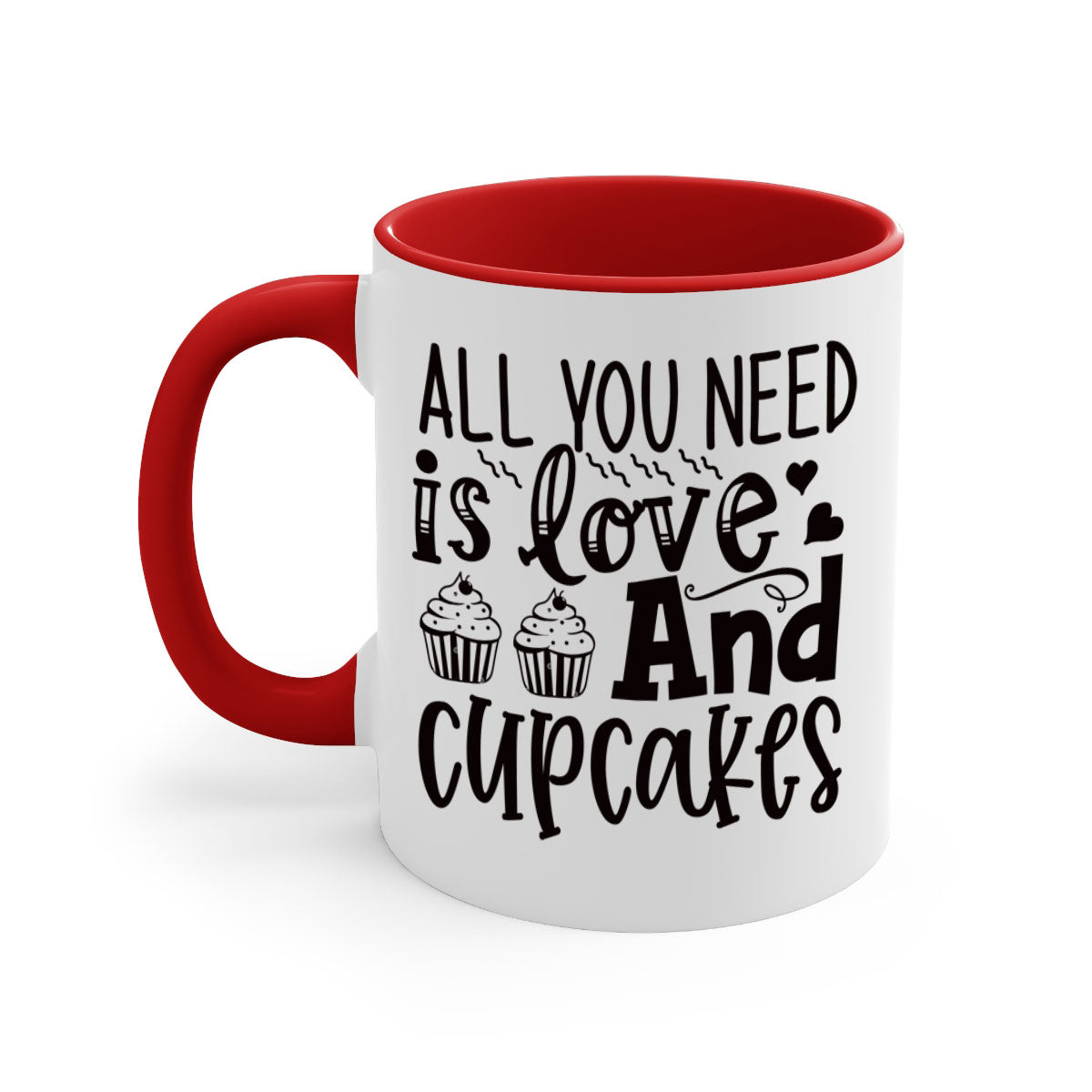 A colorful two-tone ceramic mug with the phrase 'All You Need Is Love and Cupcakes' printed on it, featuring a glossy finish and a C-shaped handle.