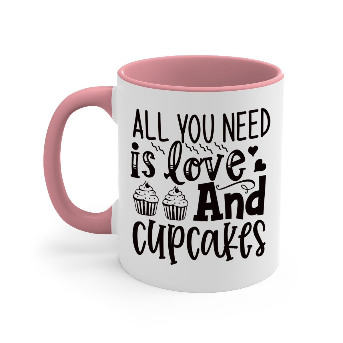 A colorful two-tone ceramic mug with the phrase 'All You Need Is Love and Cupcakes' printed on it, featuring a glossy finish and a C-shaped handle.