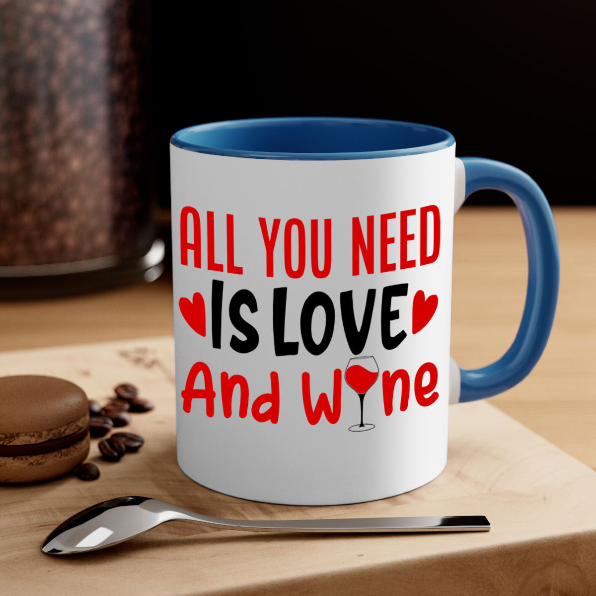 A stylish two-tone ceramic mug with the phrase 'All You Need Is Love and Wine', featuring a colored handle and glossy finish.