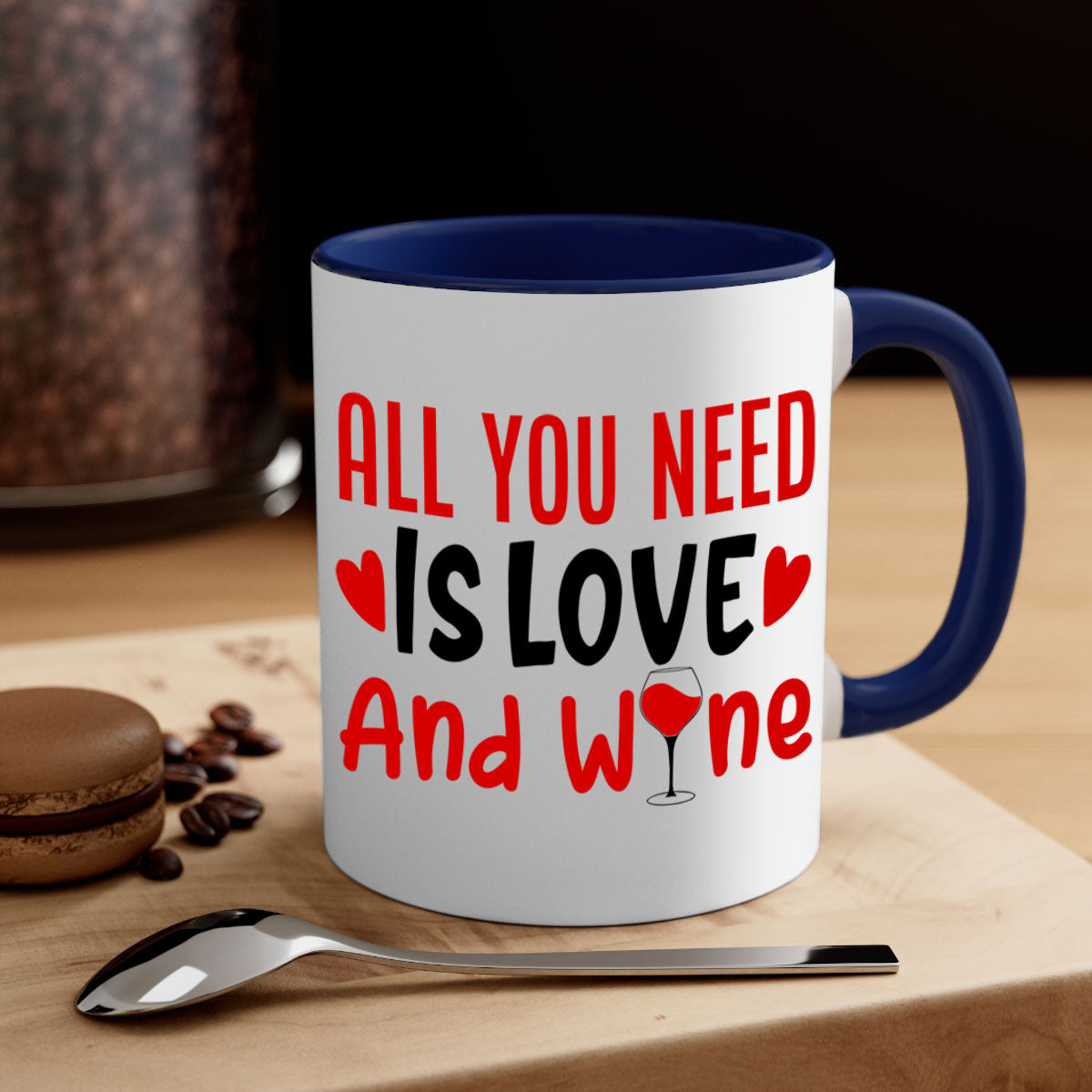 A stylish two-tone ceramic mug with the phrase 'All You Need Is Love and Wine', featuring a colored handle and glossy finish.