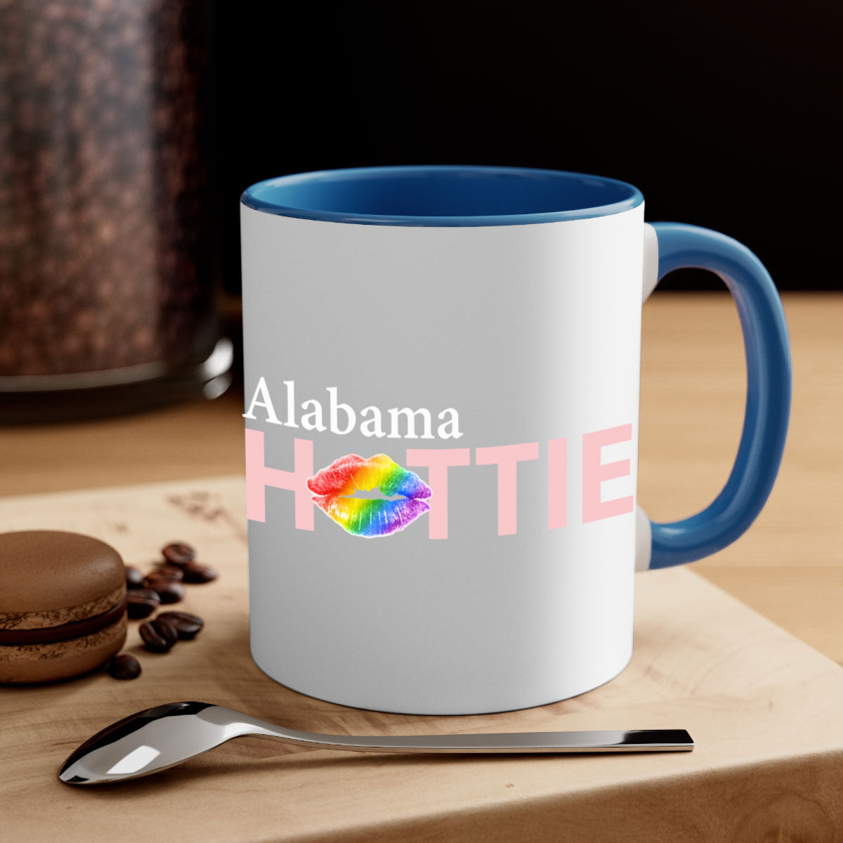 Alabama Hottie Mug featuring rainbow lips design with a glossy finish and colored handle, available in two sizes.