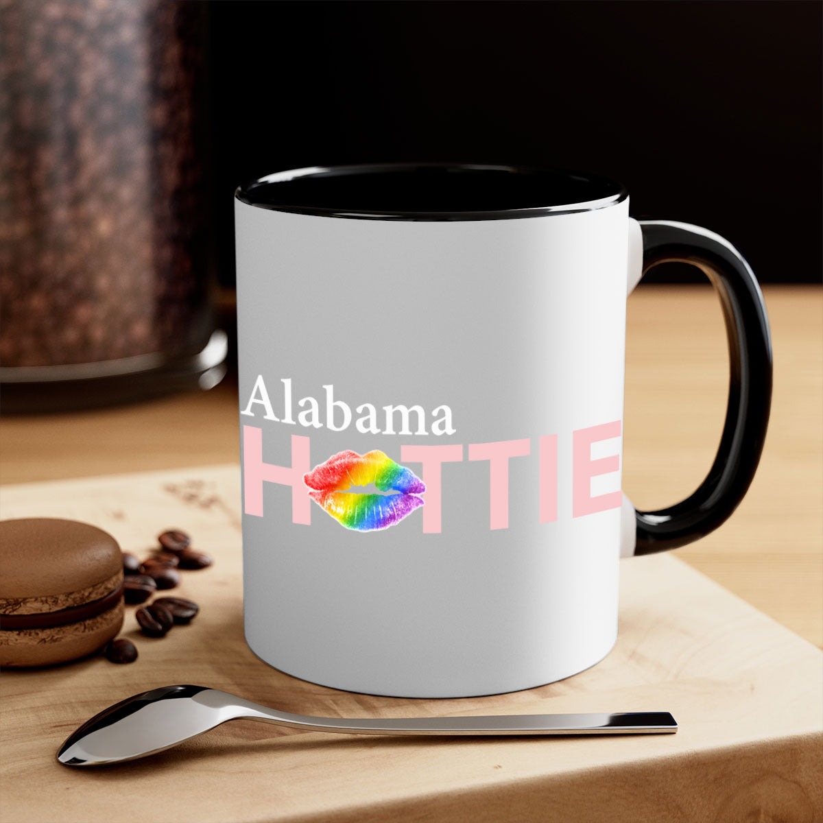 Alabama Hottie Mug featuring rainbow lips design with a glossy finish and colored handle, available in two sizes.