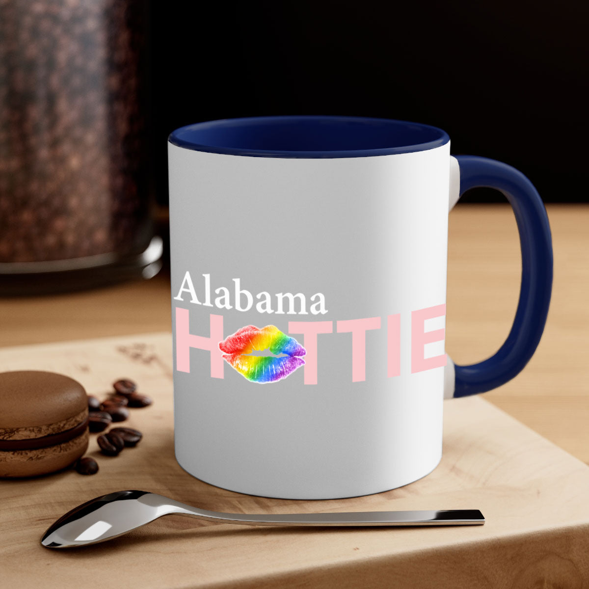 Alabama Hottie Mug featuring rainbow lips design with a glossy finish and colored handle, available in two sizes.