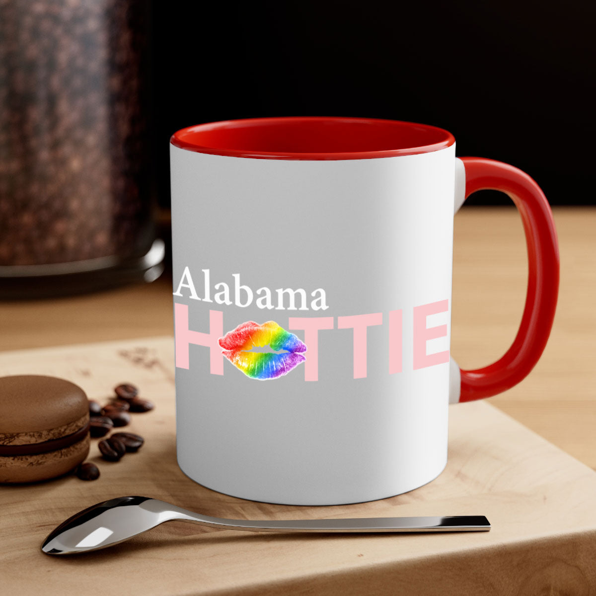 Alabama Hottie Mug featuring rainbow lips design with a glossy finish and colored handle, available in two sizes.