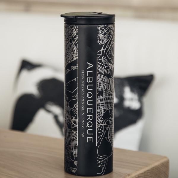 Matte black stainless steel tumbler featuring a custom engraved map of Albuquerque, New Mexico with coordinates.