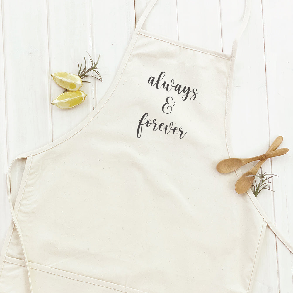 Always & Forever Women's Apron in elegant design, made from durable cotton canvas with natural twill ties and a divided front pocket.