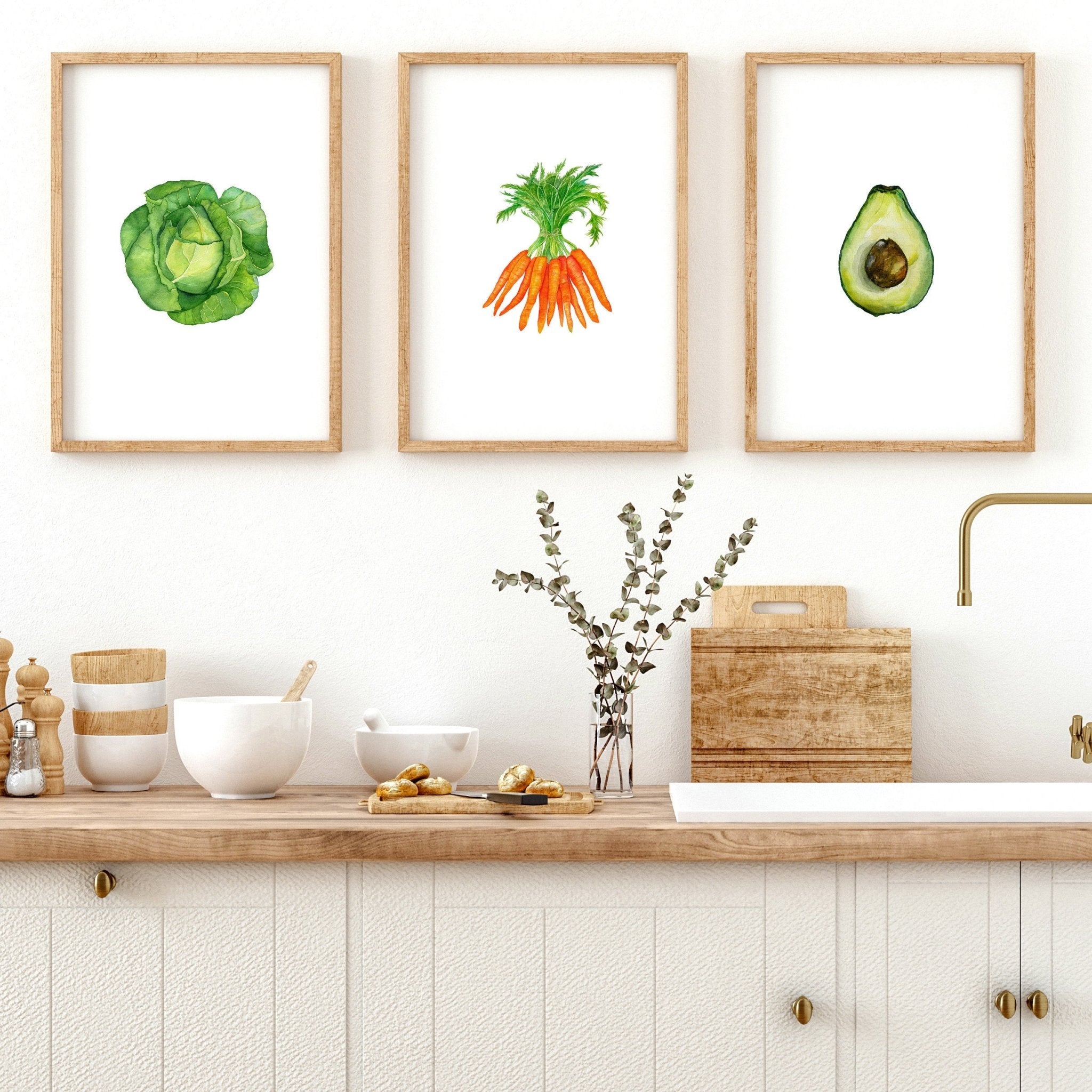 Set of 3 framed vegetable prints showcasing vibrant illustrations of vegetables, perfect for kitchen decor.