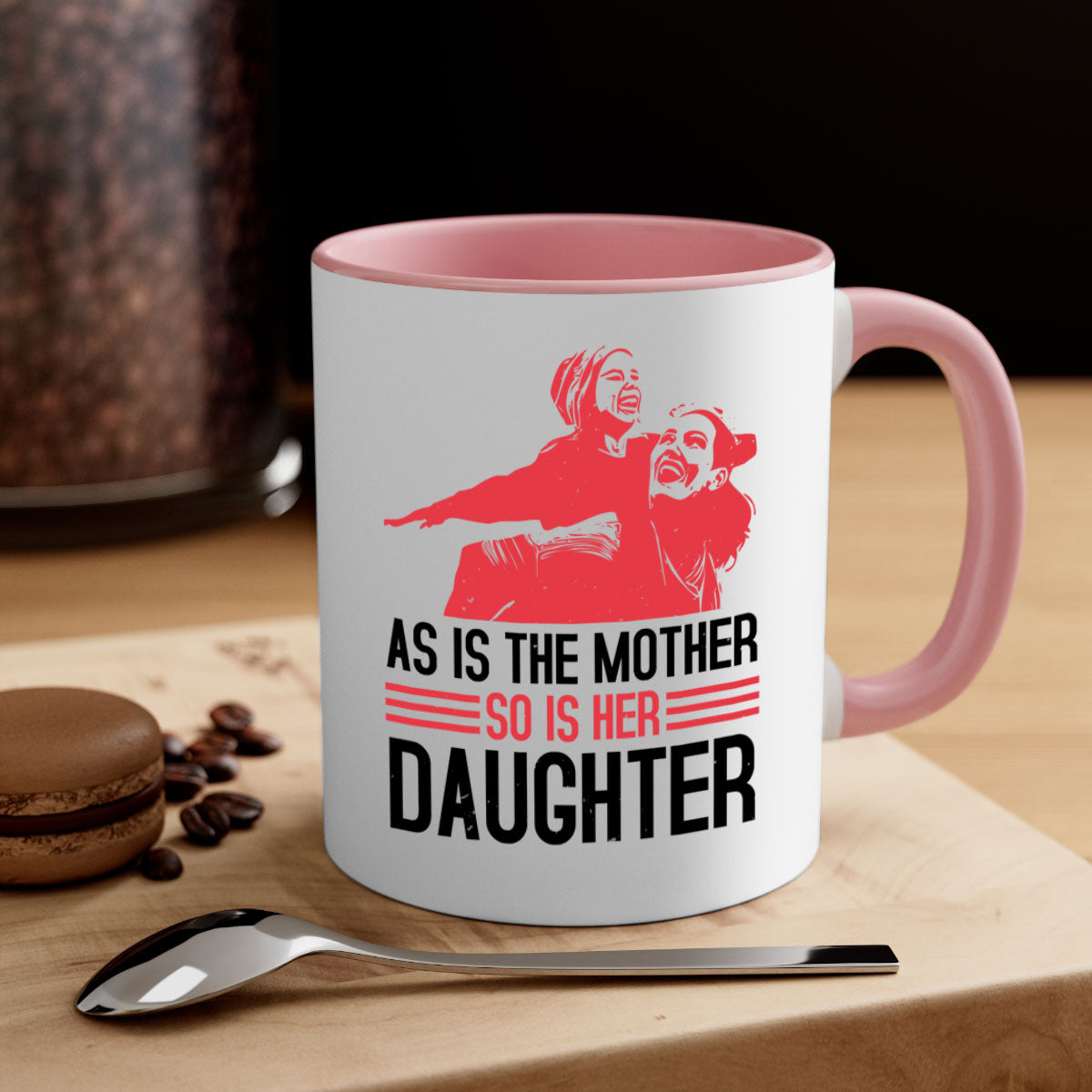 Two-tone ceramic mug with colored handle and interior, featuring the phrase 'As is the mother so is her daughter' for Mother's Day.