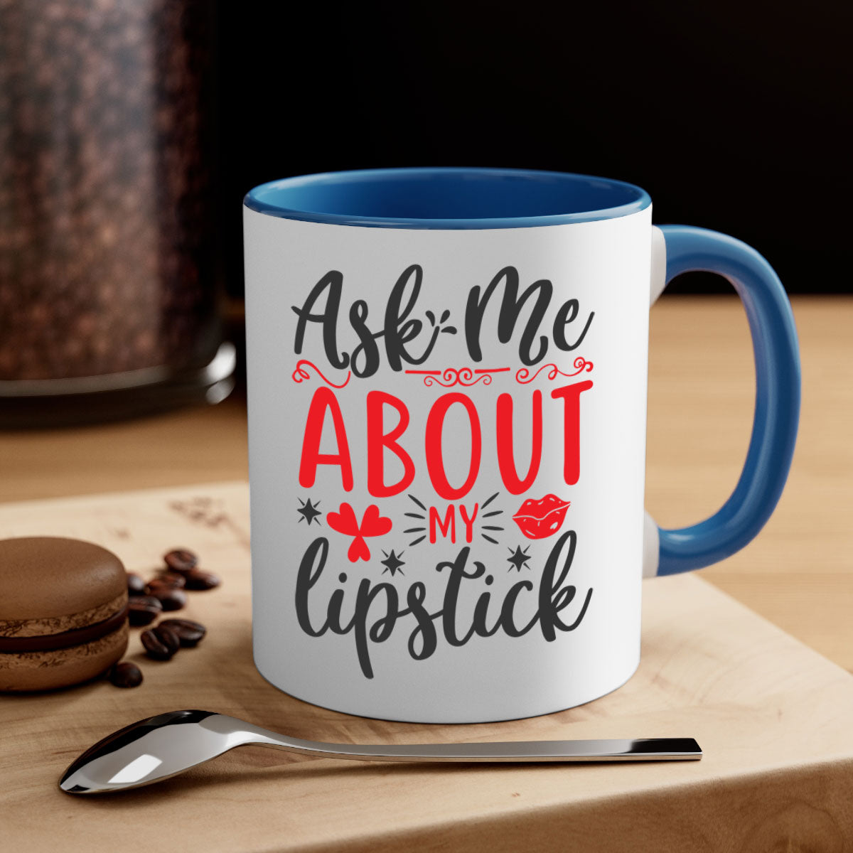 A stylish two-tone coffee mug with a colored handle and interior, featuring the phrase 'Ask Me About My Lipstick' in a glossy finish.