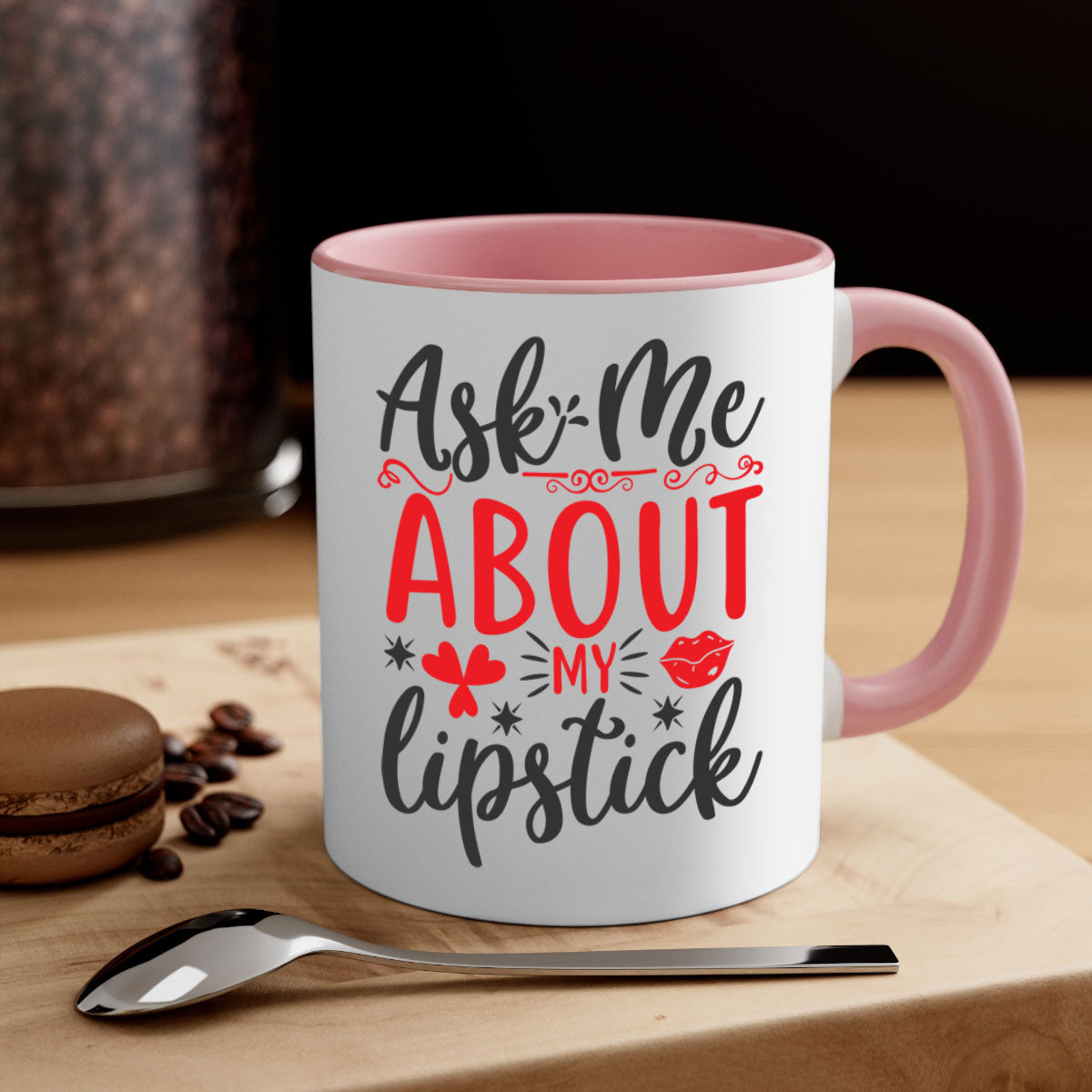 A stylish two-tone coffee mug with a colored handle and interior, featuring the phrase 'Ask Me About My Lipstick' in a glossy finish.