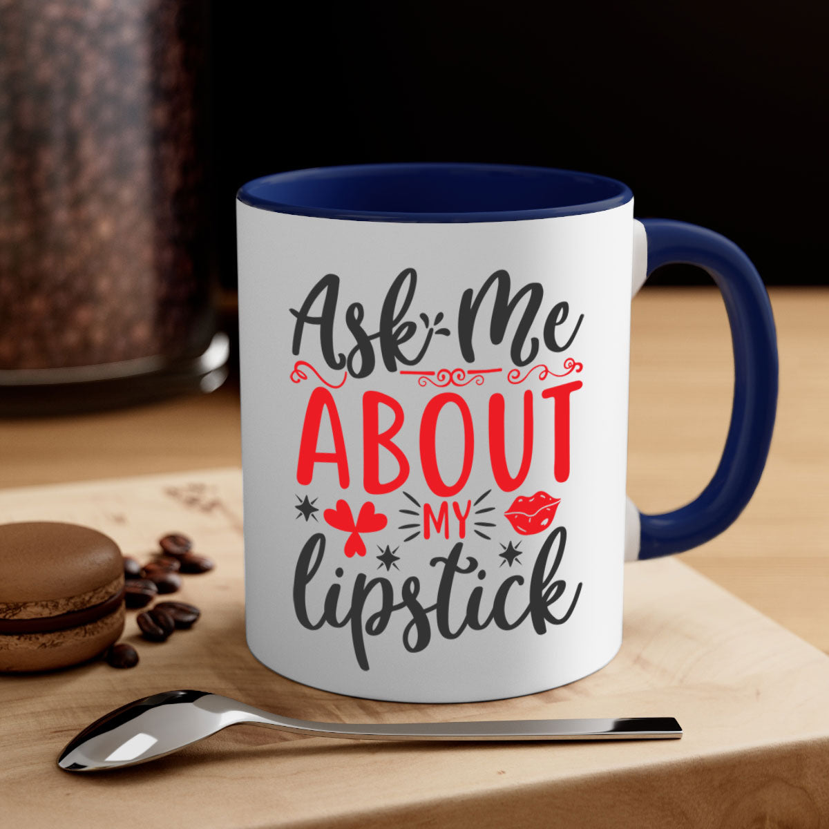 A stylish two-tone coffee mug with a colored handle and interior, featuring the phrase 'Ask Me About My Lipstick' in a glossy finish.