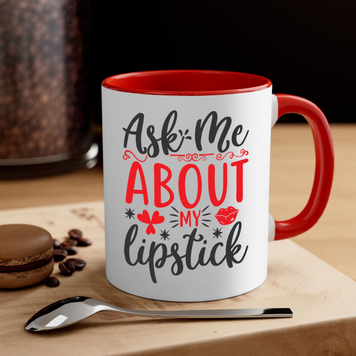 A stylish two-tone coffee mug with a colored handle and interior, featuring the phrase 'Ask Me About My Lipstick' in a glossy finish.