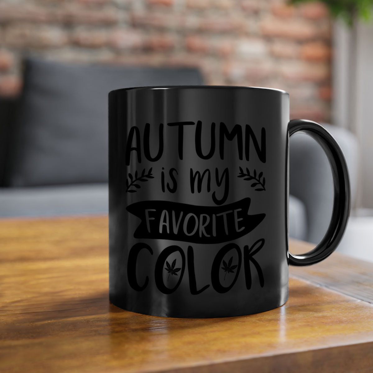 A two-tone ceramic coffee mug featuring the phrase 'Autumn is My Favorite Color' with a glossy finish and a colored handle, available in multiple colors.