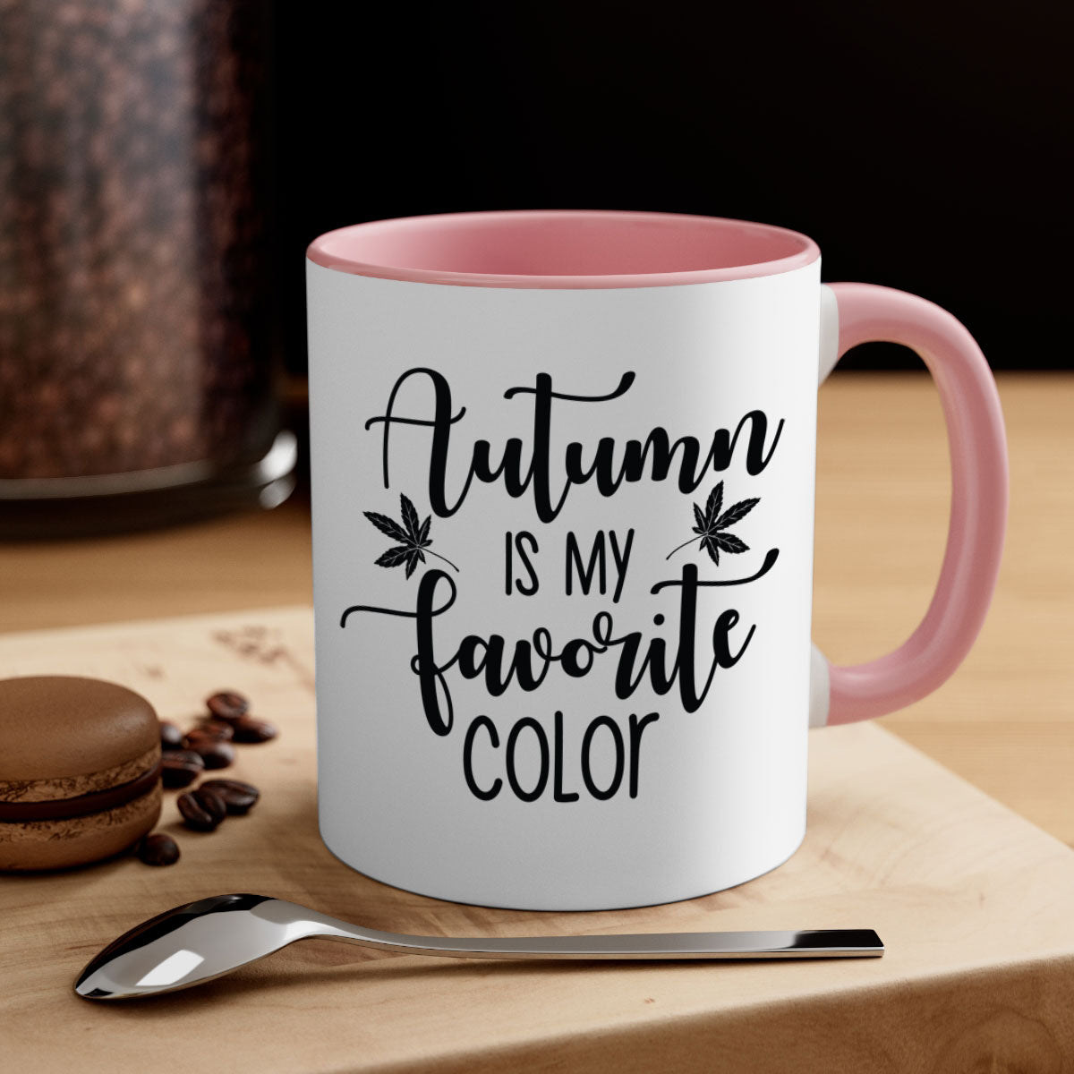 A stylish two-tone ceramic mug with a colored handle and glossy finish, showcasing the phrase 'Autumn Is My Favorite Color'.