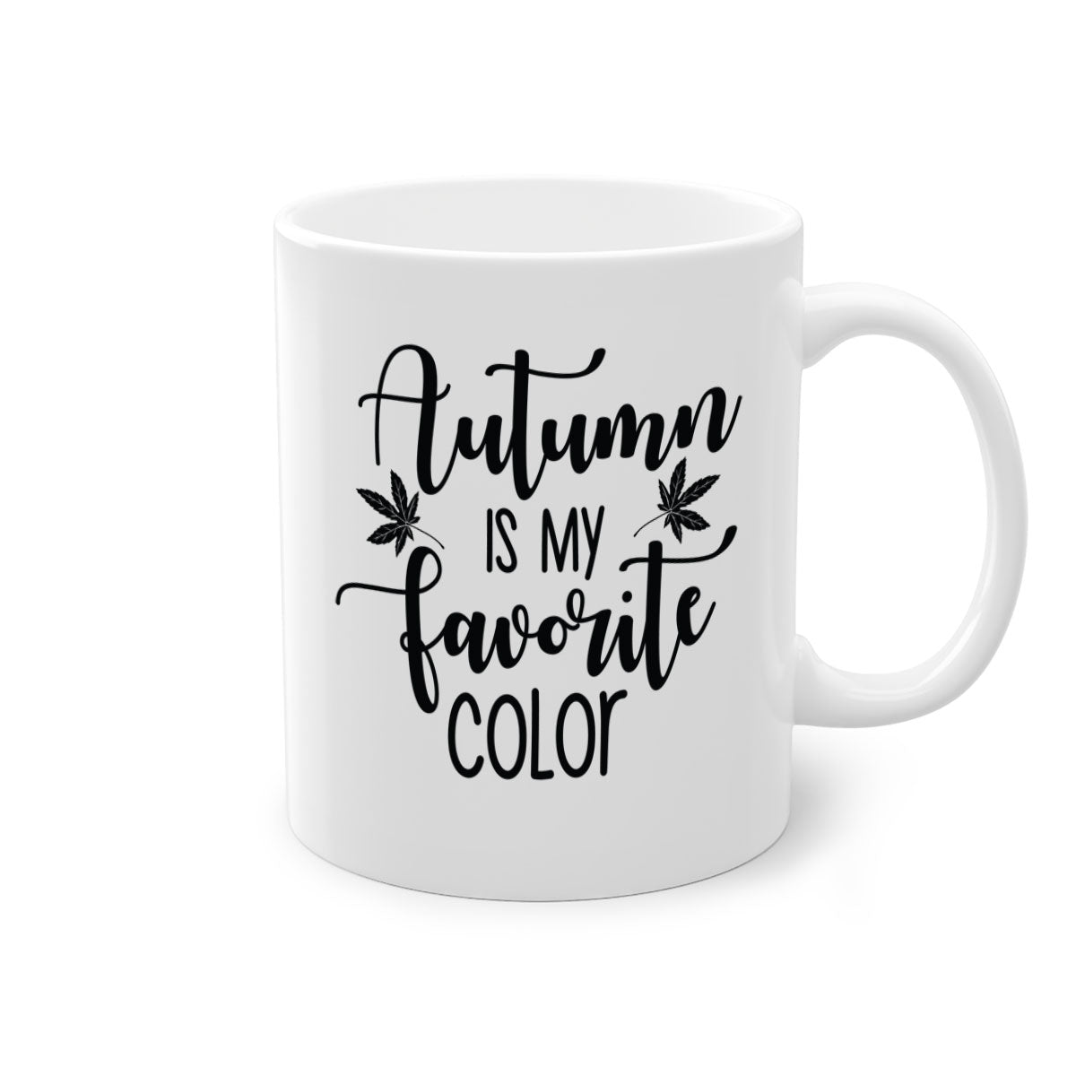 A stylish two-tone ceramic mug with a colored handle and glossy finish, showcasing the phrase 'Autumn Is My Favorite Color'.