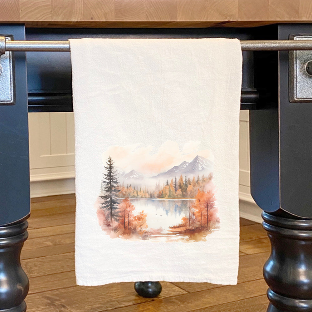 Autumn Lake Scene cotton tea towel featuring vibrant colors and serene lake imagery, perfect for kitchen use.