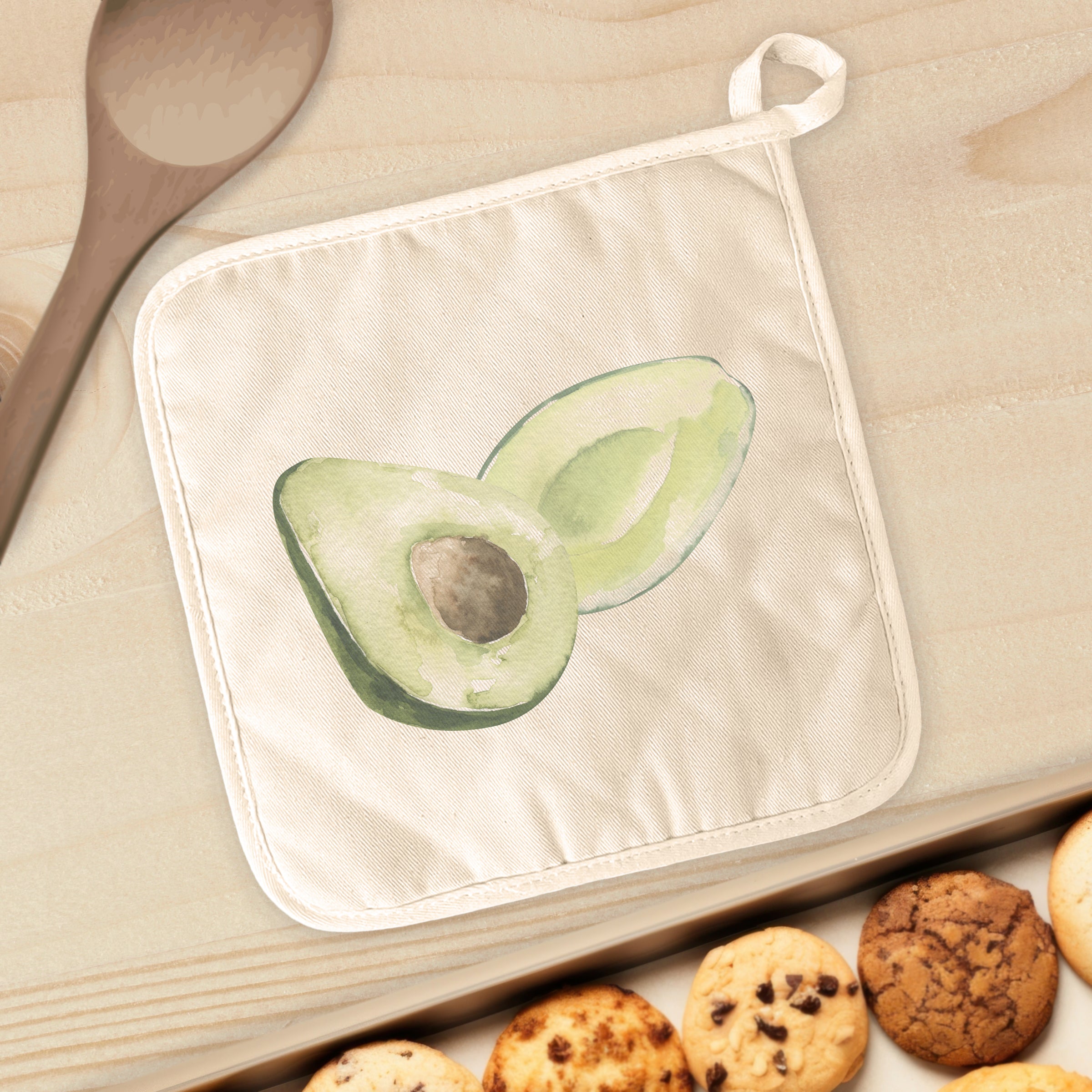 Avocado Cotton Pot Holder featuring vibrant designs and a convenient hanging loop, perfect for protecting surfaces from hot cookware.