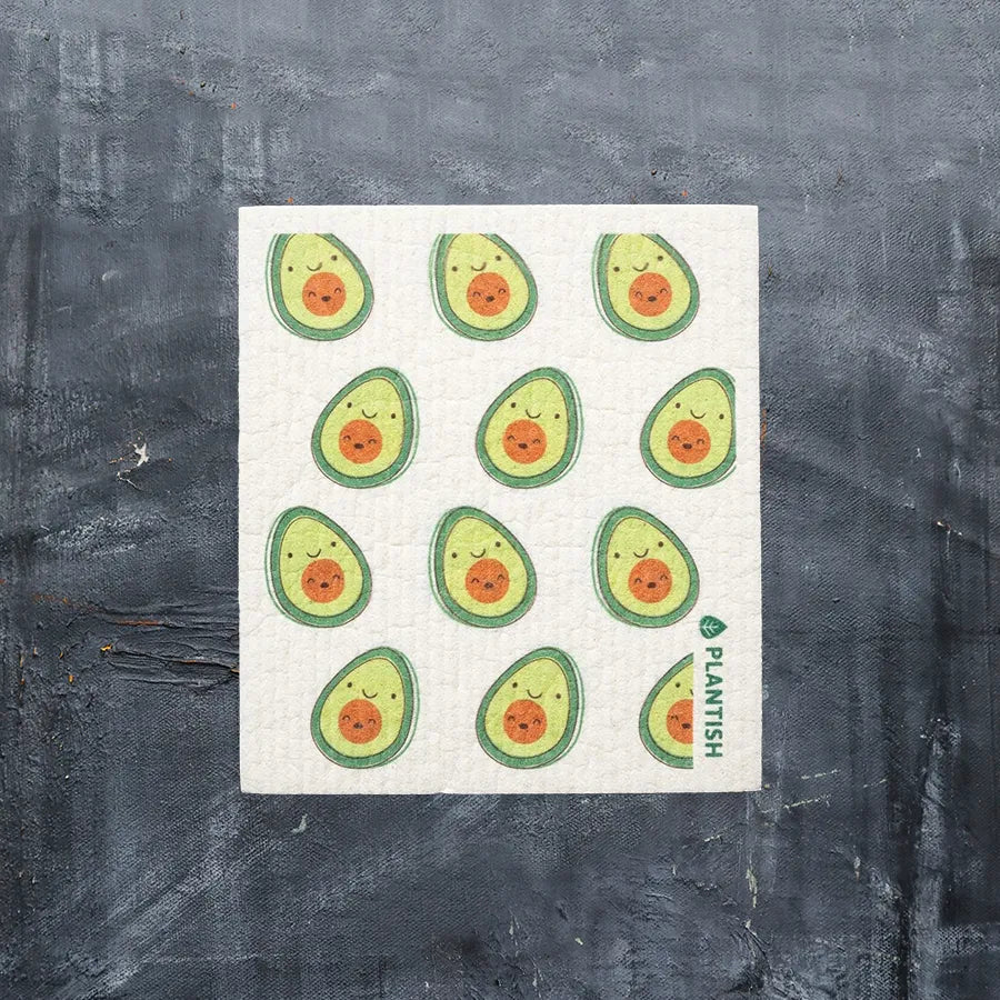 Avocado Swedish Sponge Cloth displayed in a kitchen, highlighting its vibrant avocado design and eco-friendly material.