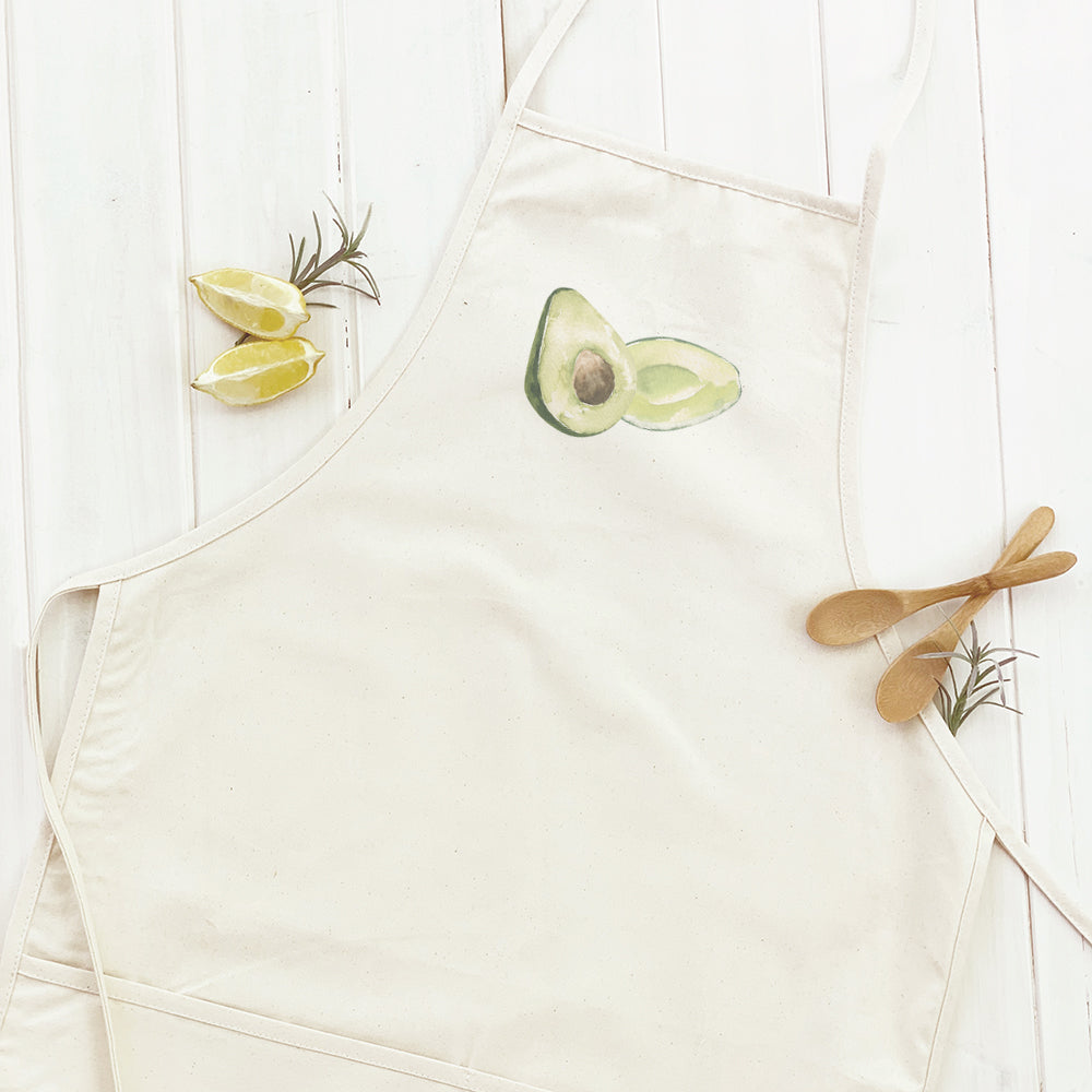 Avocado Women's Apron featuring elegant design, adjustable neck, and divided front pocket, made from durable cotton canvas.