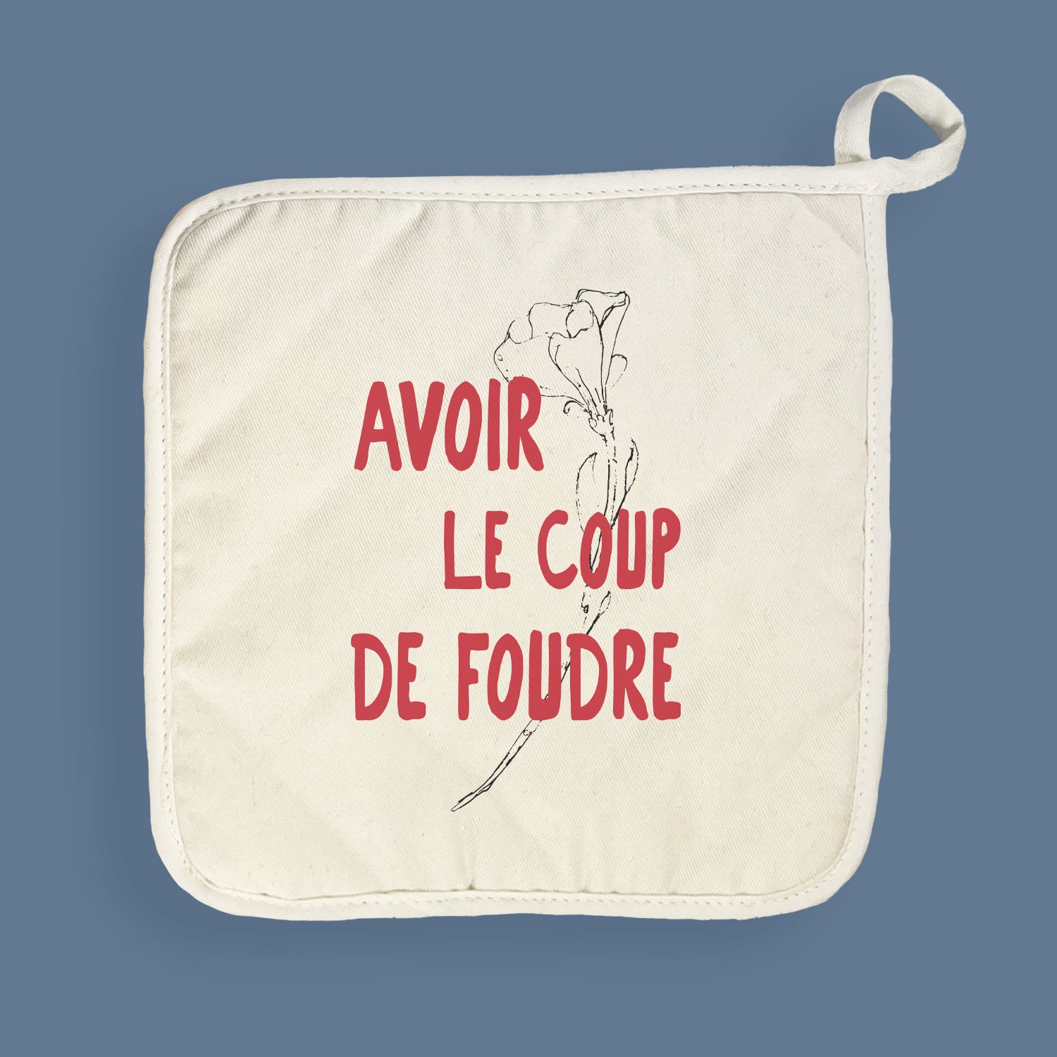 A stylish Avoir le Coup de Foudre cotton pot holder featuring vibrant designs, perfect for protecting surfaces from hot cookware.