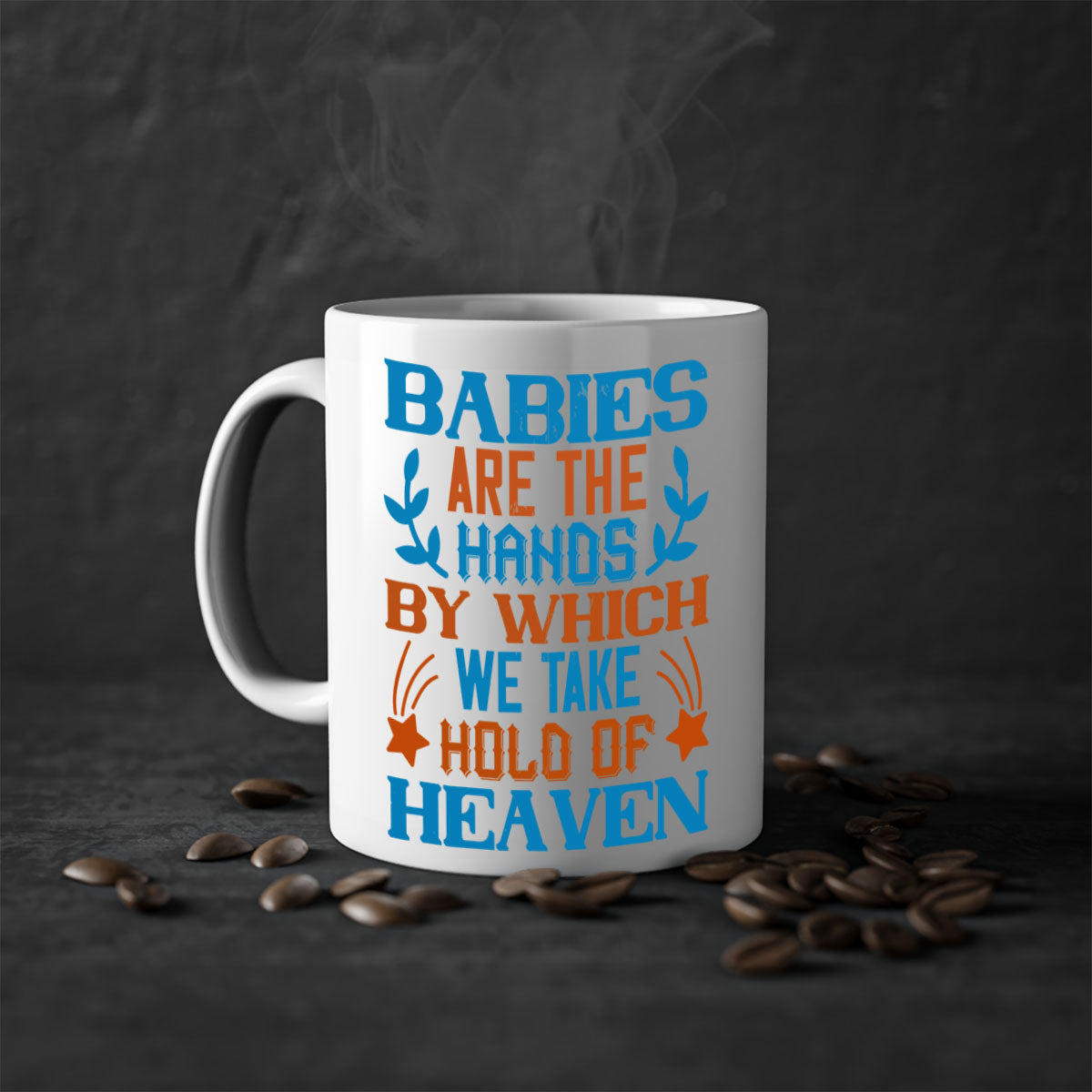 A stylish two-tone ceramic mug with a colored handle and interior, featuring the phrase 'Babies are the hands by which we take hold of heaven'.