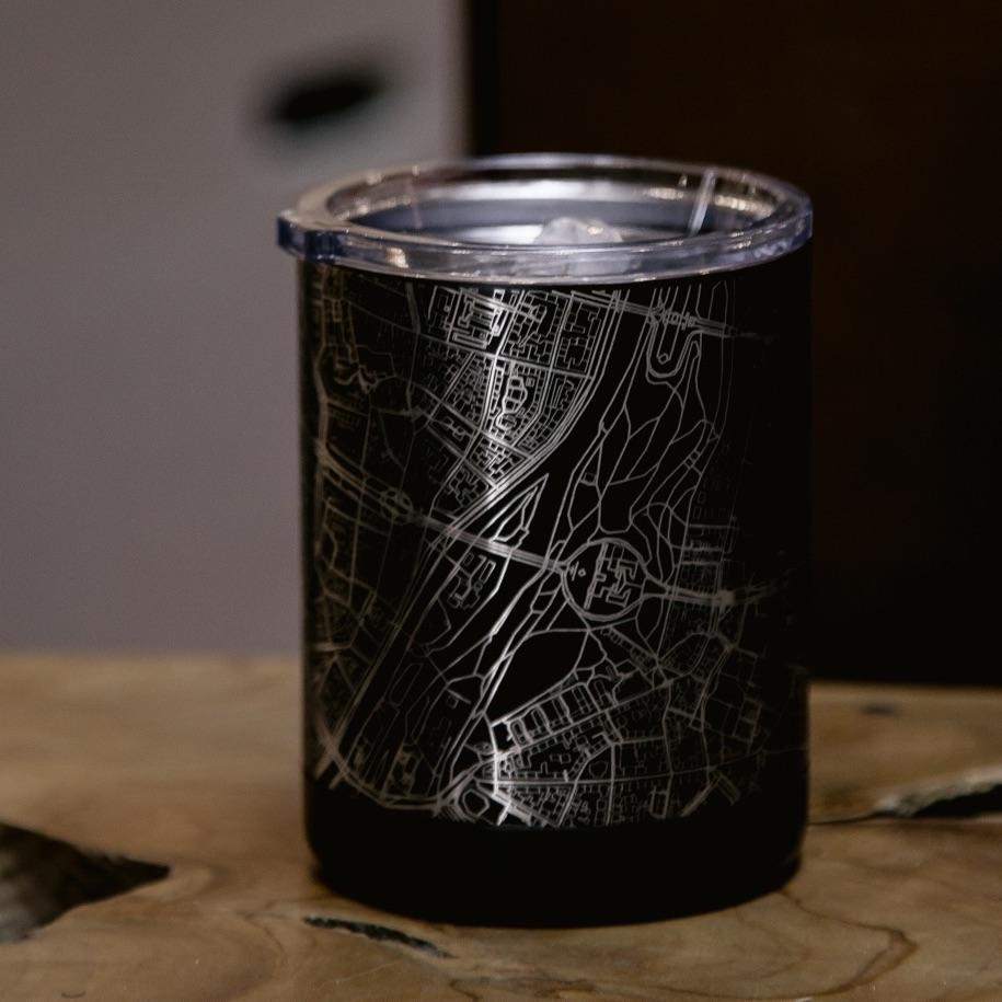 Matte black insulated cup featuring a custom engraved map of Baltimore, Maryland with coordinates.